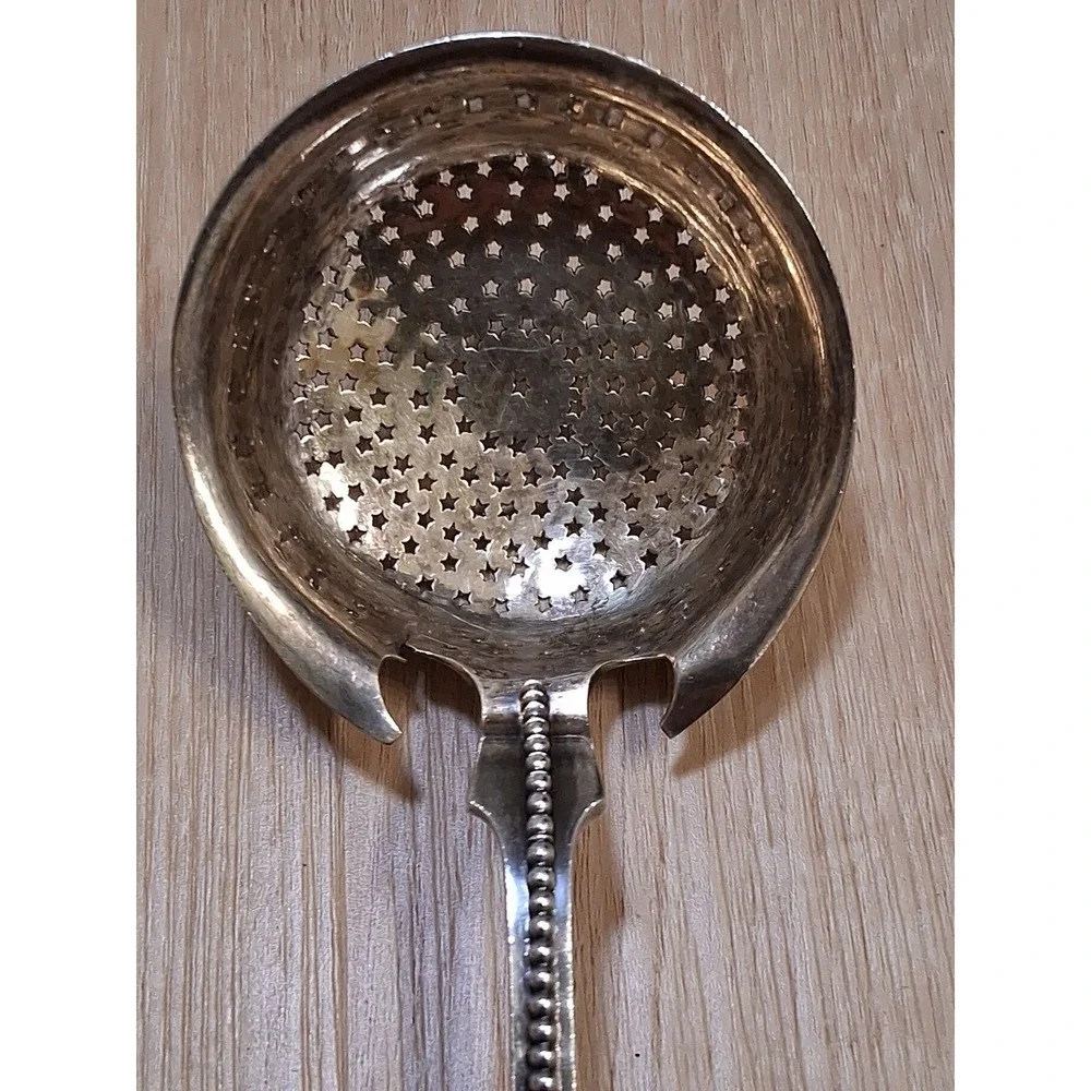WOOD & HUGHES pierced Serving Ladle / Sifter MEDALLION 3D face. Rare 1870s